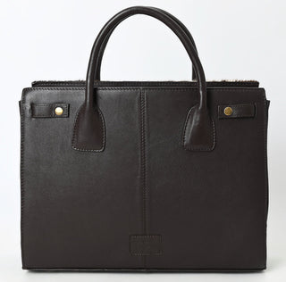 Handbag with brown and white cowhide pattern.