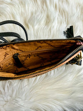 The Huck Cowhide Fringe Handbag